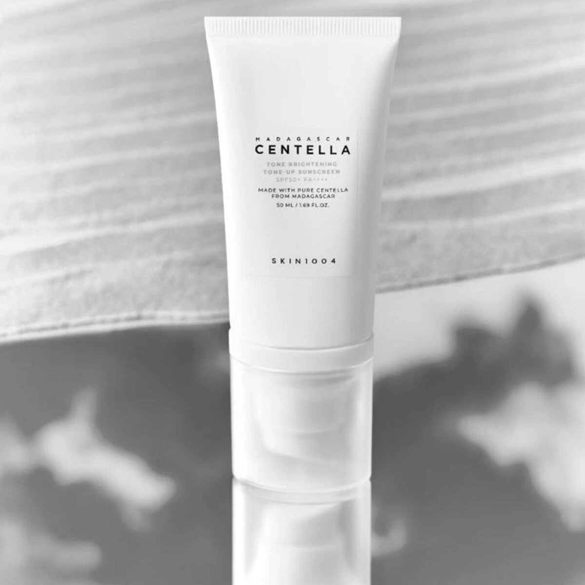 ضدآفتاب ضد لک و روشن کننده سنتلا اسکین 1004 5